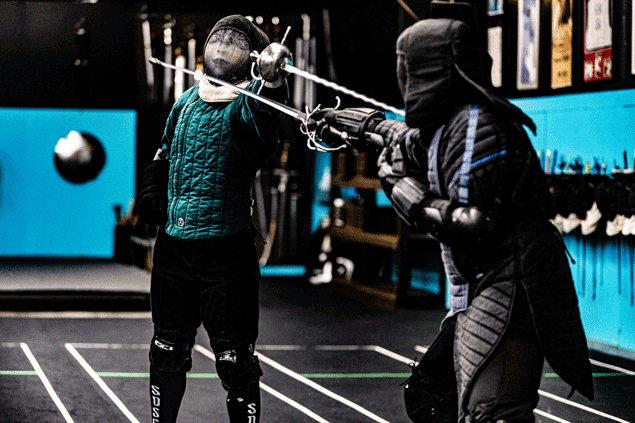 two rapier duelists fighting